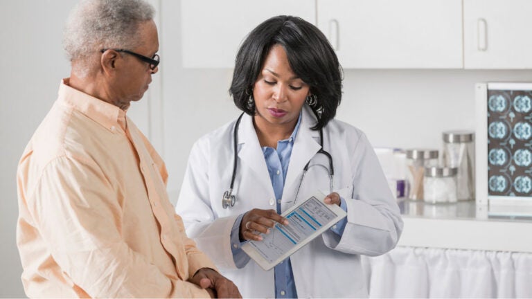 Doctor speaking with patient